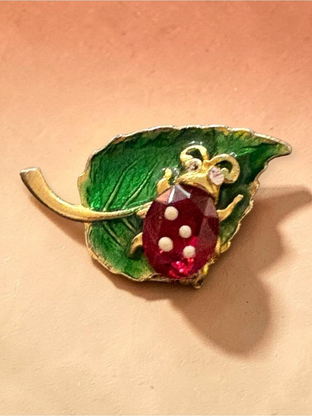Vintage Gold Tone Red Crystal Ladybug on Green Leaf Brooch Pin